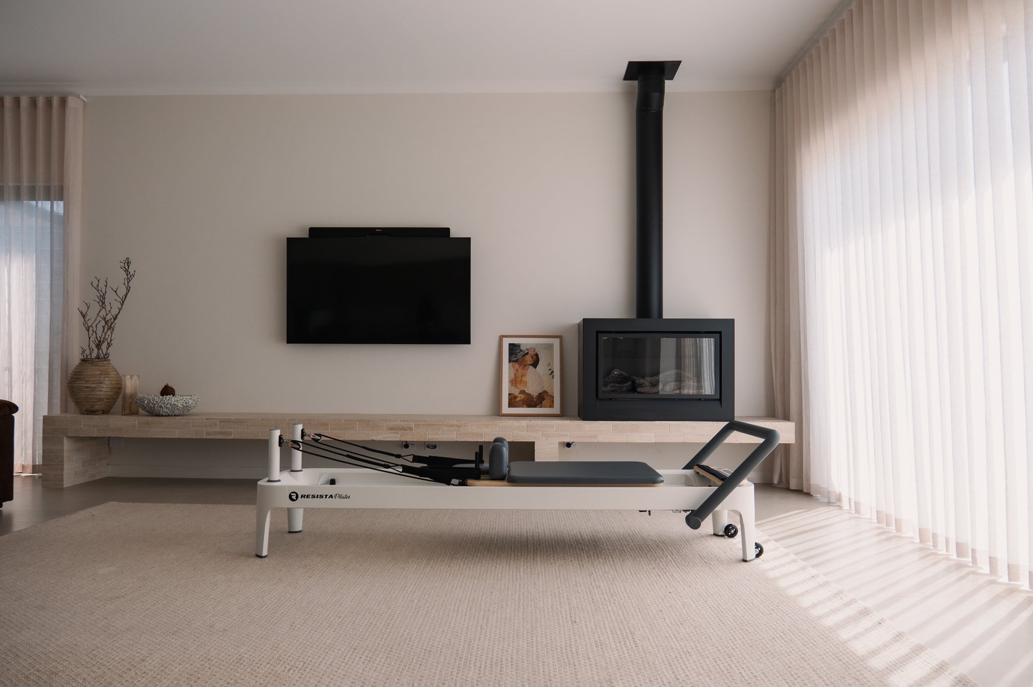 Commercial-Quality Reformer White Pilates Reformer in a home
