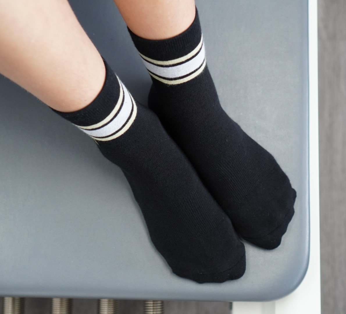 RESISTA Pilates Crew Grip Socks Black'n'Gold Hoops on Pilates Reformer