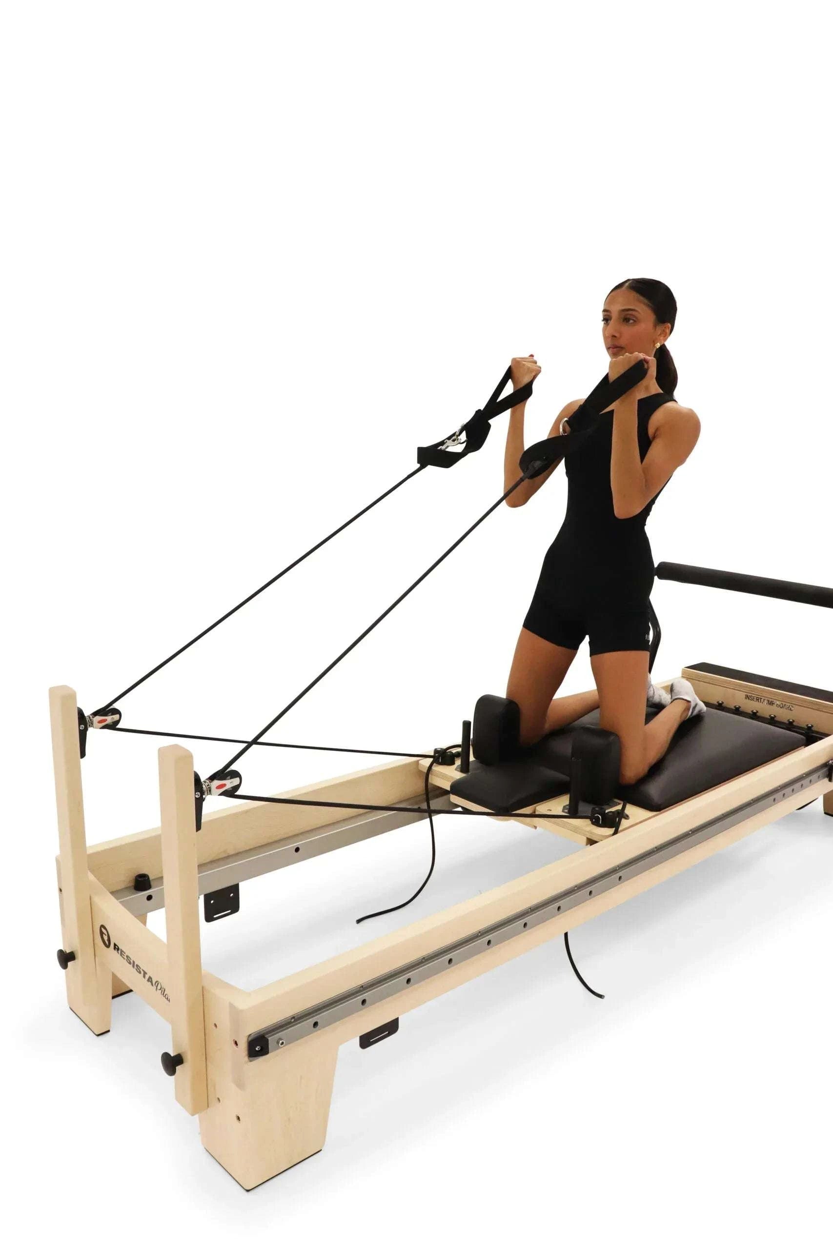 Resista Maple Reformer with Sliding Footbar Pilates practice